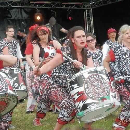 Drummers infront of a stage